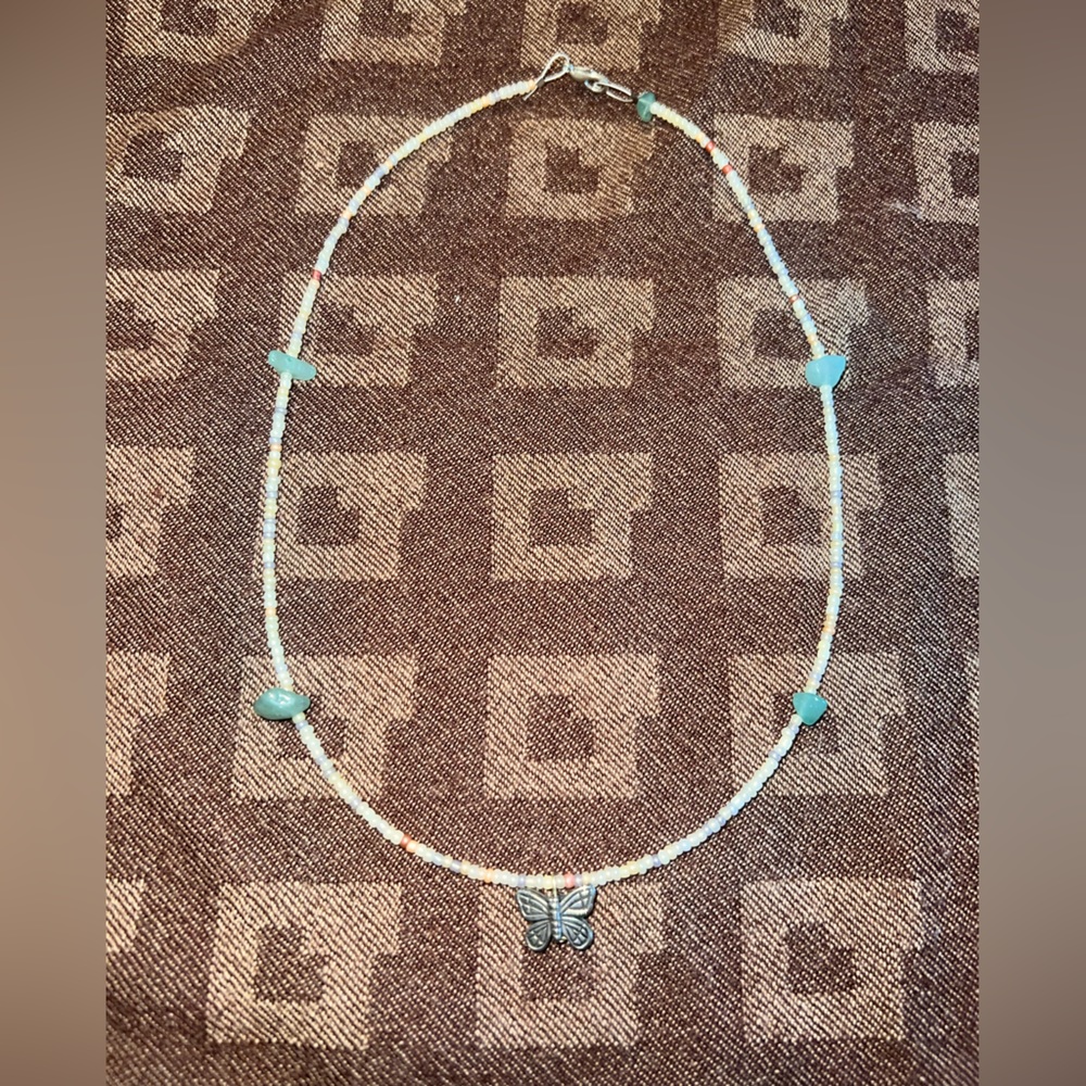 Handmade jewelry with butterfly charm